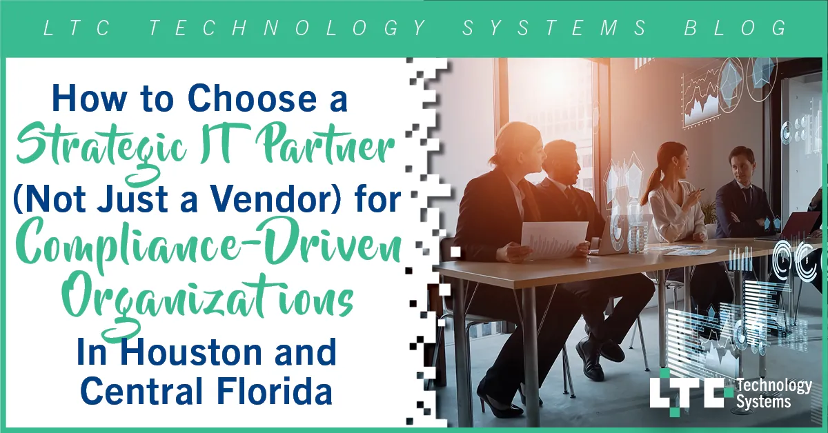 Business leaders meeting with a strategic IT partner about compliance and technology planning